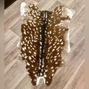 Faux deer hide rug
